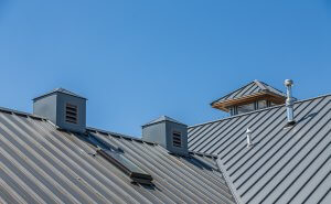 Metal roof under a blue sky