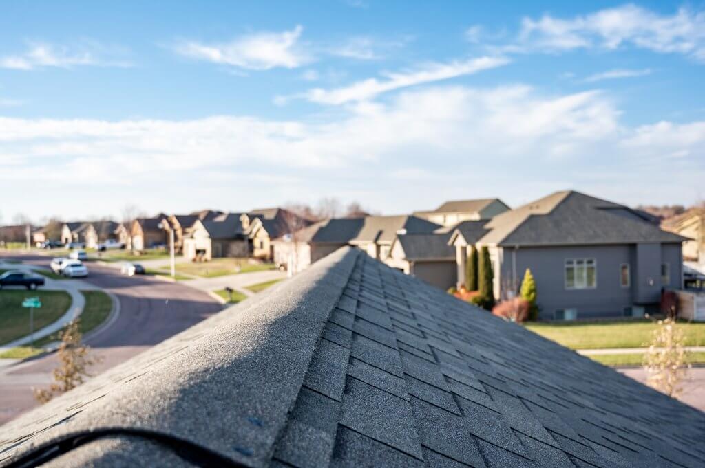 Typical residentail ridge cap on a shingle roof apex