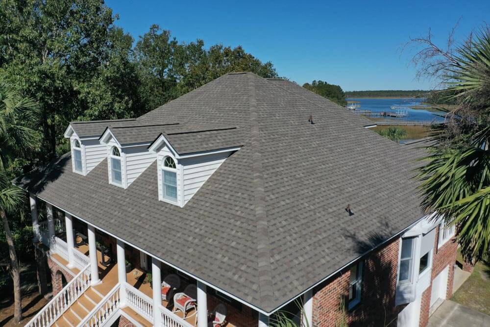 after shot of roof replacement, grey shingles