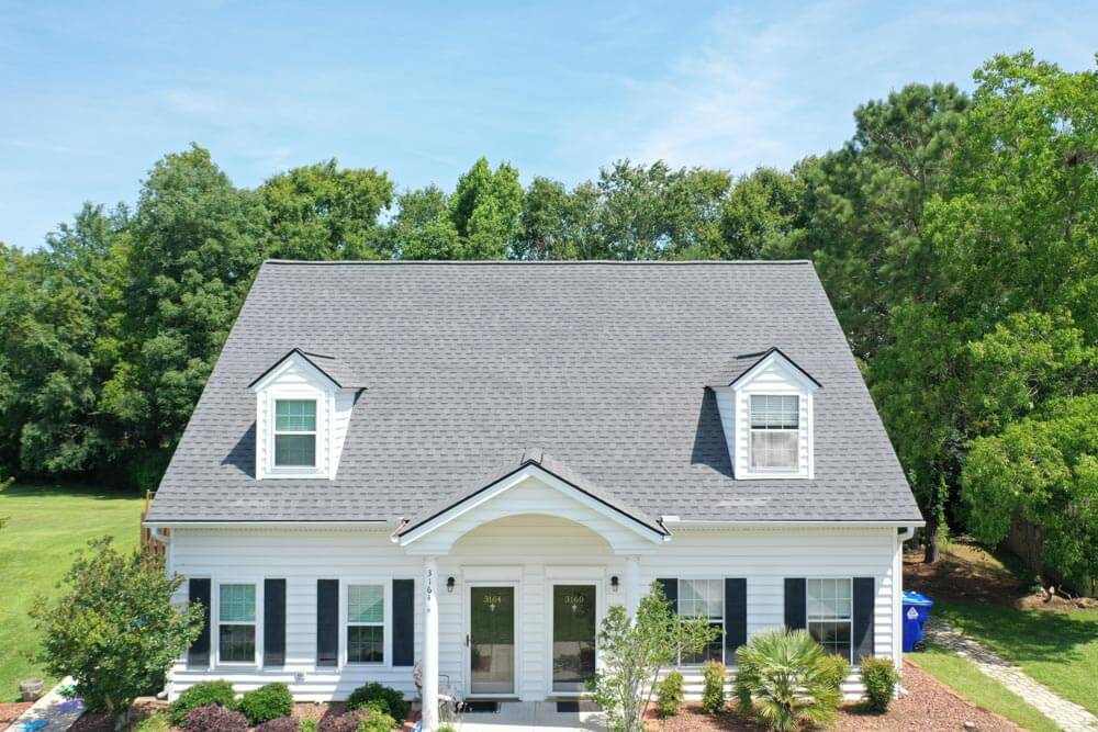 after shot of roof replacement, grey shingles