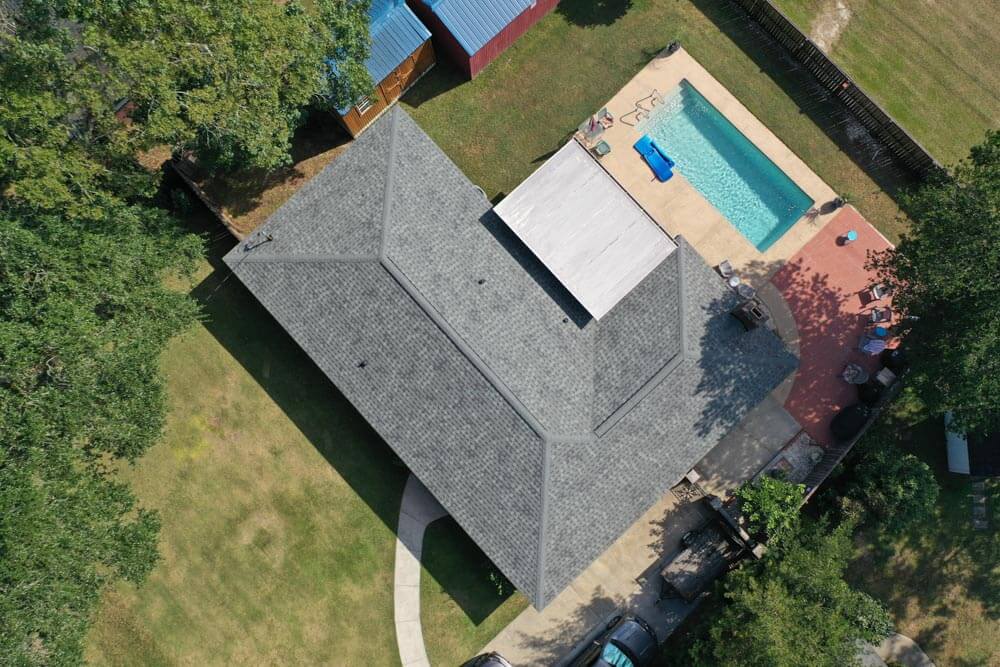 after shot of roof replacement, grey shingles