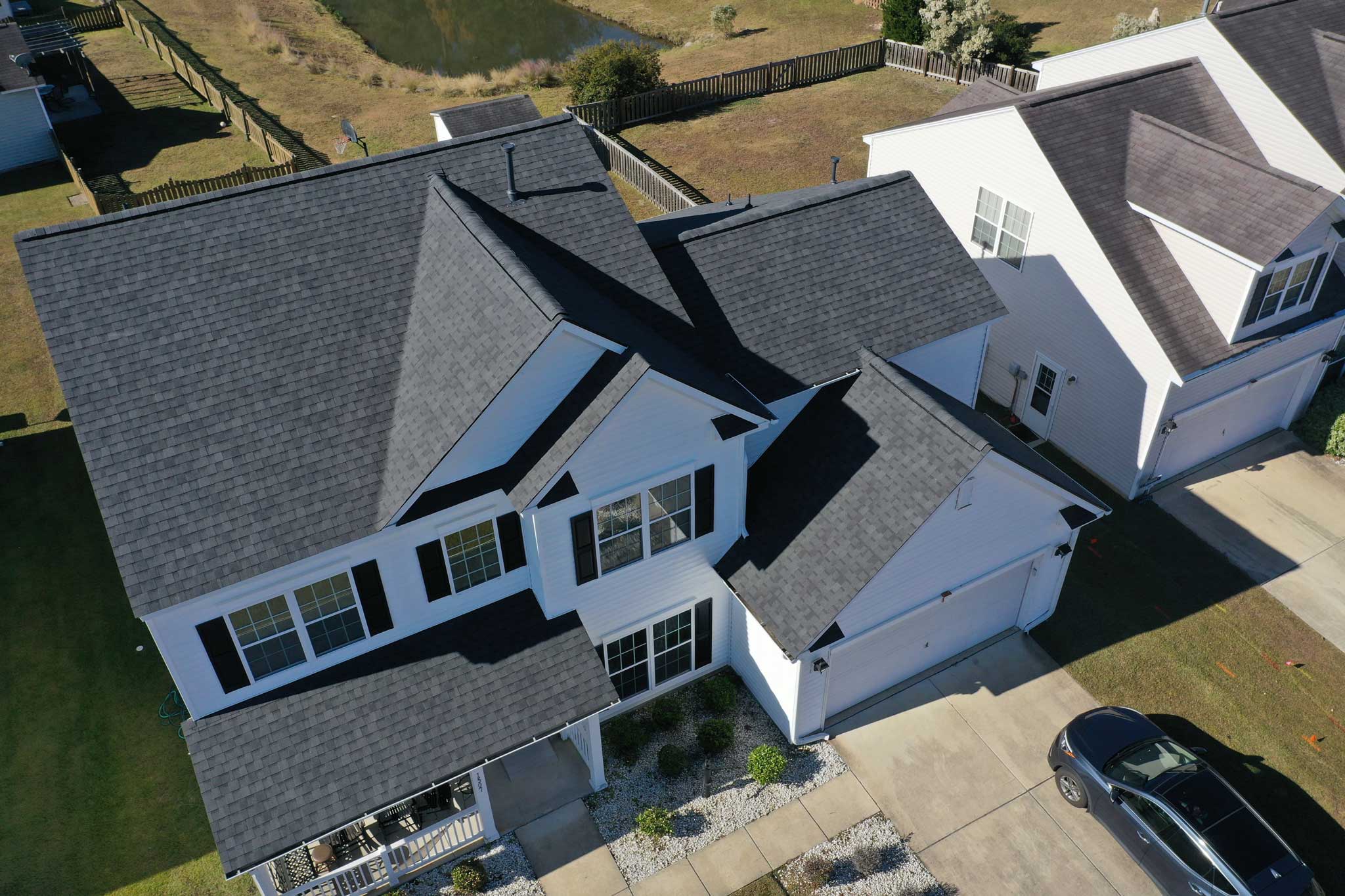 after shot of roof replacement, grey shingles